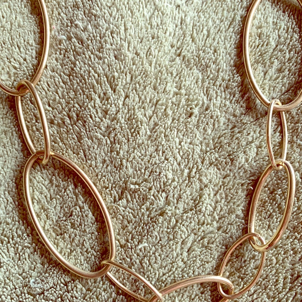 Long gold tone necklace